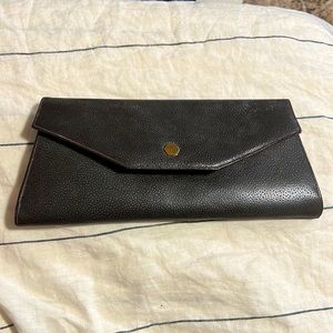 De Liso Debs by Lennox black textured leather envelope clutch